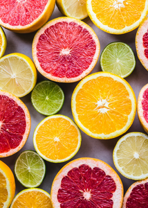 Fotografia de naranjas, limones y toronjas